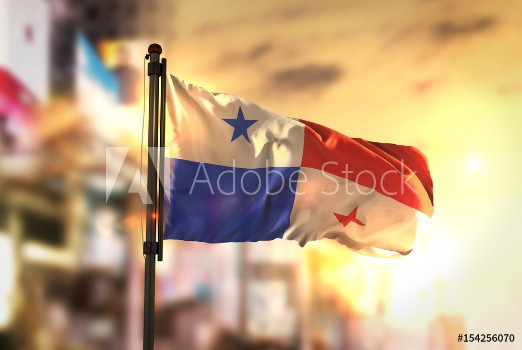 Bild på Panama Flag Against City Blurred Background At Sunrise Backlight